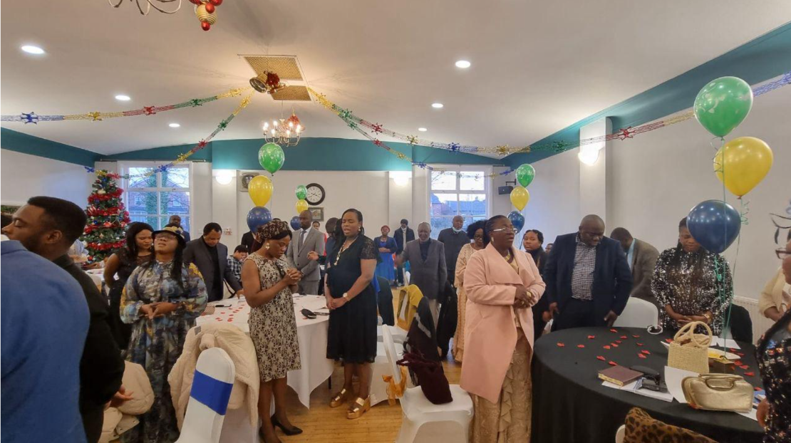 Divine Homes Prayer Ministry members standing together in prayer